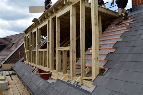 Calculations needed for a dormer window with a flat roof structure. . Adding a dormer to a trussed roof